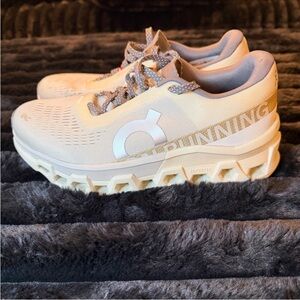 On Running CloudMonster Sneakers - Cream
Women's Size 7